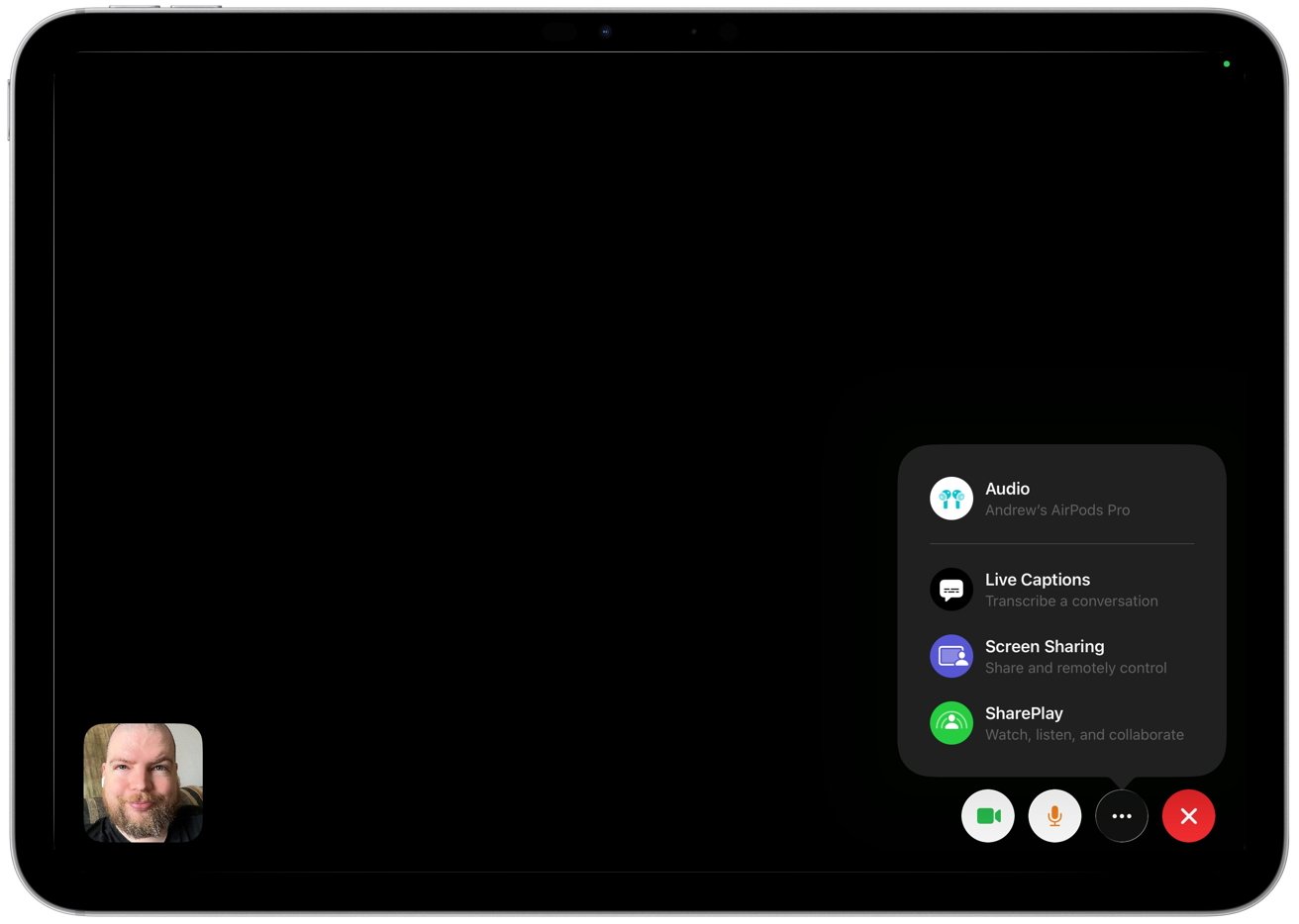 FaceTime call on tablet with black screen, small caller video bottom left, and call options panel on right showing audio, live captions, screen sharing, SharePlay, and end-call controls